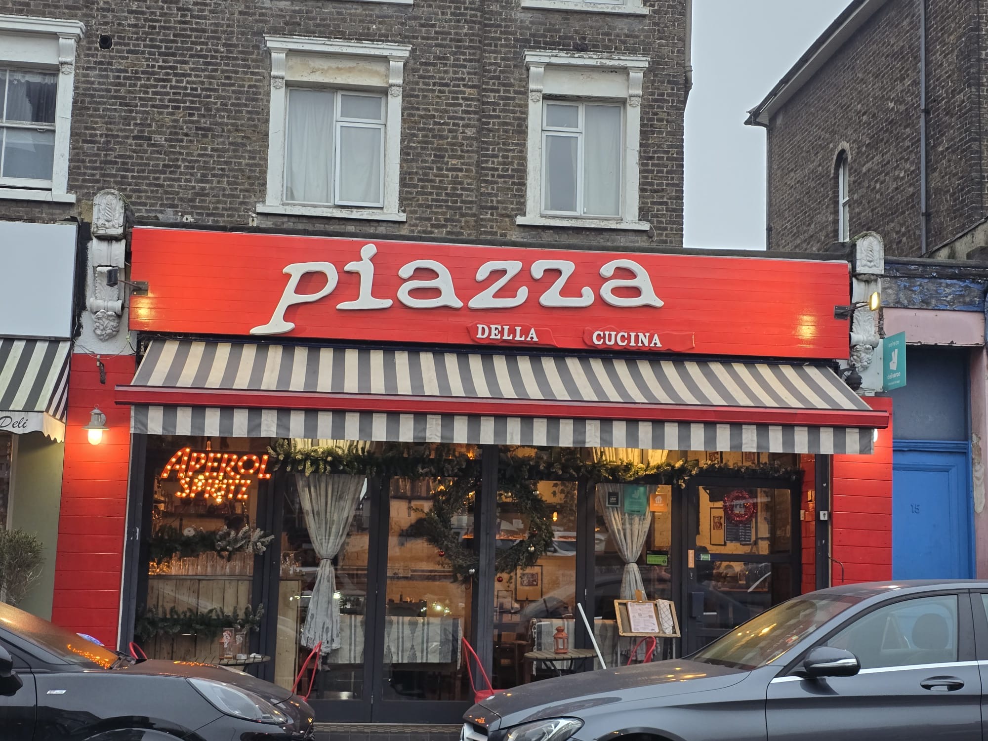 After — Piazza Della Cucina with its red painted frontage.